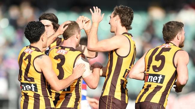 Tom Mitchell celebrates a goal against the Bulldogs at UTAS Stadium. Picture: Getty