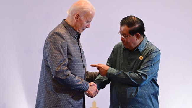 Cambodia's Prime Minister Hun Sen admires Joe Biden’s fashion sense at the East Asia Summit dinner in Phnom Penh on Saturday night. Picture: AFP