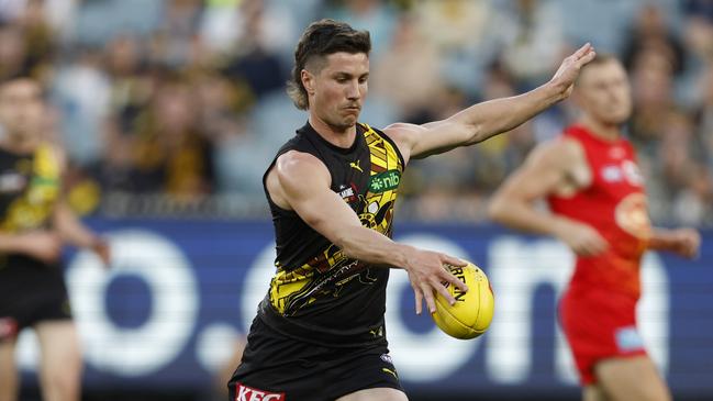 MELBOURNE, AUSTRALIA - AUGUST 24:  Liam Baker kick a goal during the round 24 AFL match between Richmond Tigers and Gold Coast Suns at Melbourne Cricket Ground, on August 24, 2024, in Melbourne, Australia. (Photo by Darrian Traynor/Getty Images)