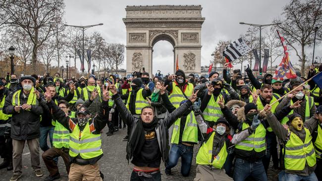 Yellow-vest protesters on the Champs-Elysees in Paris. Picture: Getty Images