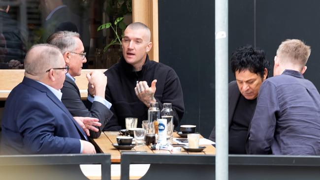 Foxtel boss Patrick Delany, Fox Sports managing director Steve Crawley, Dustin Martin, Fox Footy commentator Jack Riewoldt and Martin's manager Ralph Carr.