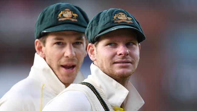 Australia captain Tim Paine (L) and Steve Smith during the Ashes. Picture: Oli Scarff/AFP