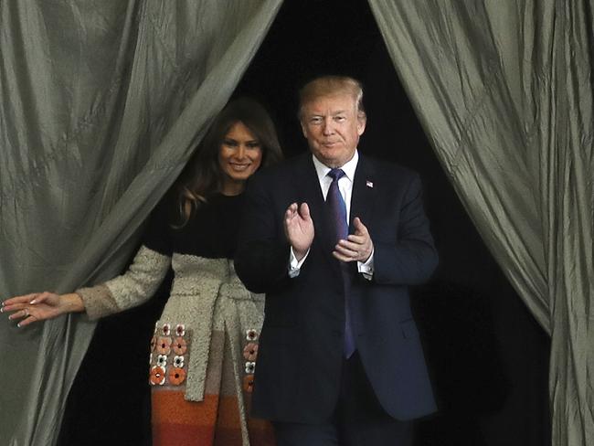 U.S. President Donald Trump and first Lady Melania Trump arrive at the stage in order to greet the US military personnel and the members of Japan Self Defense Forces upon his arrival at the US Yokota Air Base on the outskirts of Tokyo. Picture: Eugene Hoshiko/AP