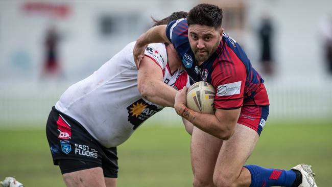 2nd April 2023. News Local.Sport. Campbelltown, Sydney, NSW, Australia.Action pics from Macarthur Rugby League,First Grade: Campbelltown Collegians (blue) v Oakdale Workers (white) at Bradbury Oval, Campbelltown.Collegians Leon Longbottom tackled by Nathan Davis.Pics by Julian Andrews.