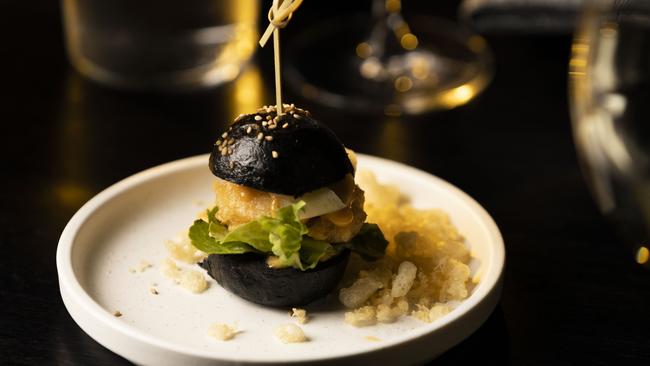 A mini charcoal black burger at RB Dining.