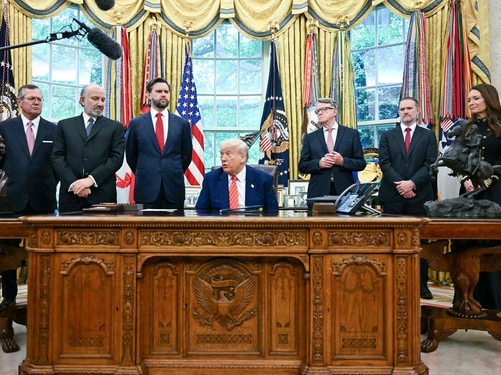 Donald Trump makes a trade announcement as US Secretary of Commerce Howard Lutnick (2L), US Vice President JD Vance (3L), British ambassador to the United States Peter Mandelson (3R), US Trade Representative Jamieson Greer (3R) and US Secretary of Agriculture Brooke Rollins (R) look on in the Oval Office of the White House in Washington, DC. Picture: AFP