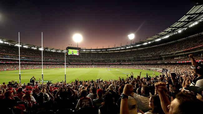 Collingwood fans celebrate a goal with a big crowd during the Round 1 AFL match between the Collingwood Magpies and the Sydney Swans at the MCG on March 15, 2024. Photo by Phil Hillyard(Image Supplied for Editorial Use only - Phil Hillyard  **NO ON SALES** - Â©Phil Hillyard )