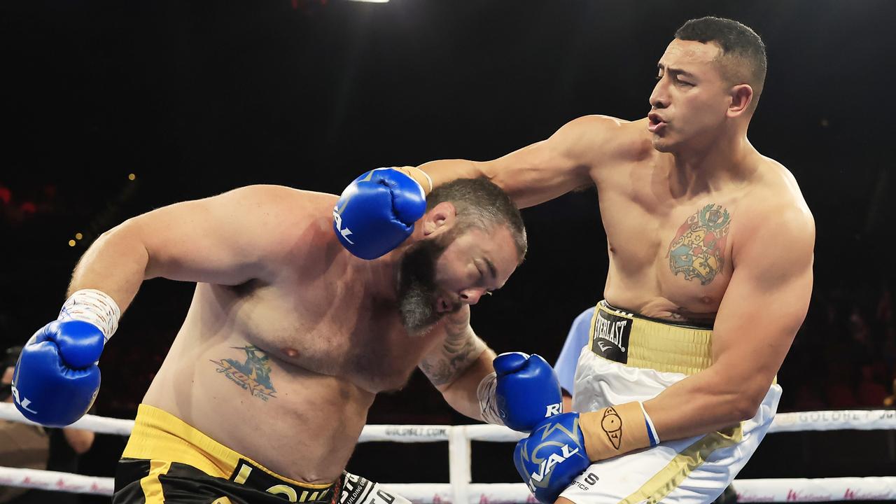 Sio Siua Taukeiaho (R) throws a punch in the heavyweight fight. (Photo by Mark Evans/Getty Images)