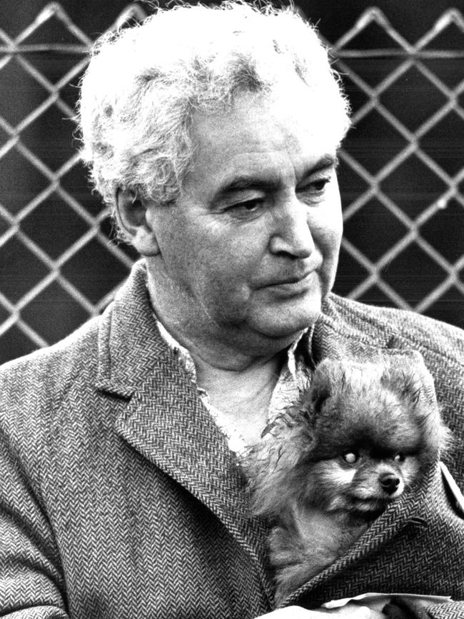 The late Bruce Goodluck with his pet pomeranian named Ambrose.