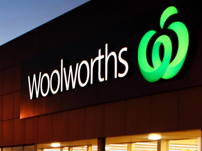 Mount Gambier, South Australia, Australia - June 6, 2015: Woolworths Store at Commercial Road East Mt Gambier. Customers arrive at the Store to Shop in the Early Evening. Woolworths is the Largest Australian Owned and Operated Supermarket/Grocery Chain in Australia, with over 933 stores throughout Australia.