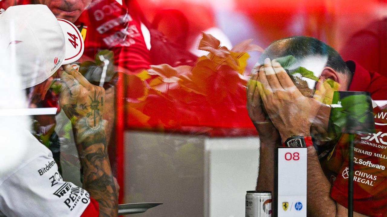 Lewis Hamilton speaks to Ferrari boss Fred Vasseur before the Miami Grand Prix. Photo by CHANDAN KHANNA / AFP)