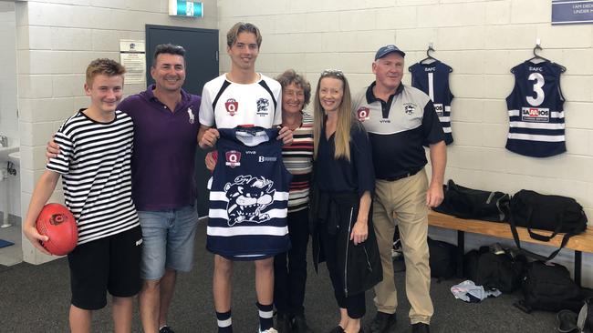 Broadbeach Cats player Aiden Fyfe and his family after being presented his guernsey ahead of his QAFL debut. Picture: Supplied.