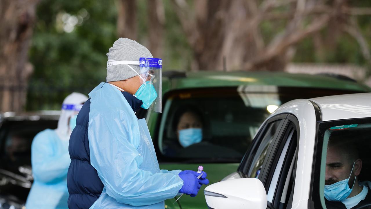 Nurses perform swabs at the Covid testing clinic at Fairfield Showground. Picture: NCA Newswire /Gaye Gerard