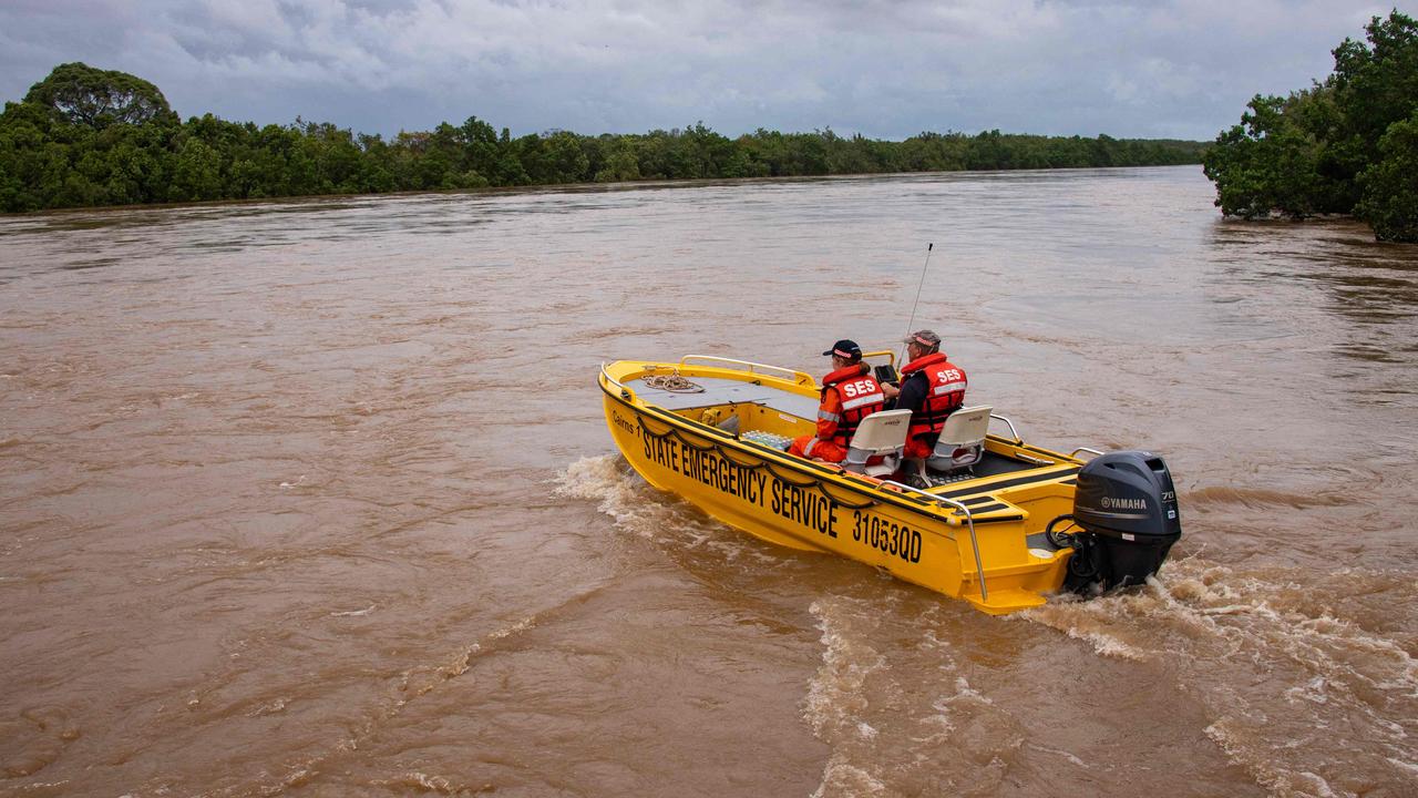 Emergency workers and “Good Samaritans” have been praised for their work to help flood-affected people in Far North Queensland. Picture: Brian Cassey / AFP.