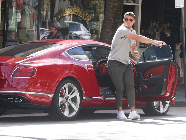 Sam Burgess spotted getting out of his red Bentley in Woollahra yesterday. Picture: ©CHOWN IMAGE