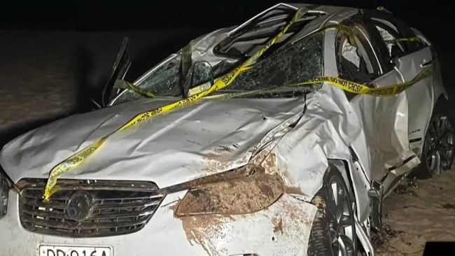 The wreck of the white Holden sedan that drove off the cliff and landed on Maslin Beach. Picture: 7NEWS