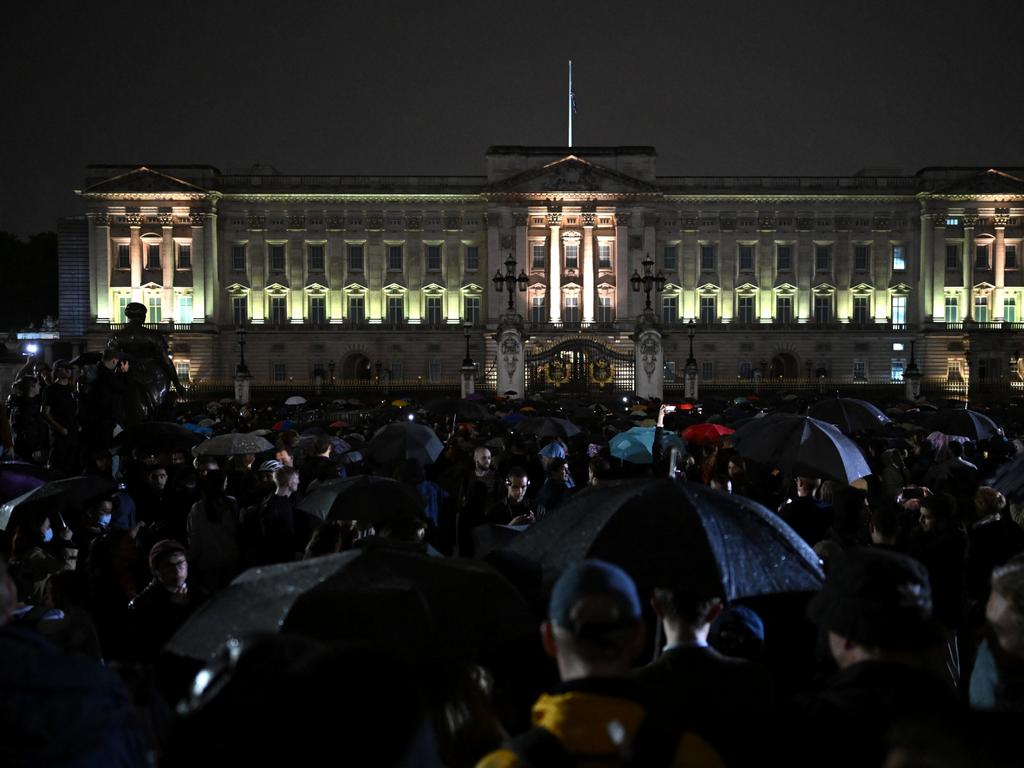 Crowds have gathered at Buckingham Palace as news spread about the Queen’s death. Picture: Getty Images