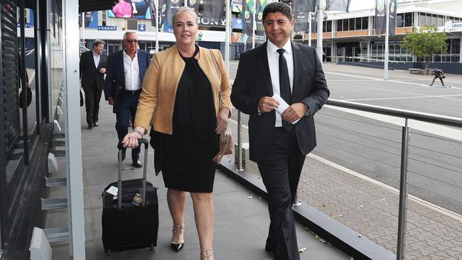 Rebecca Frizelle of the Titans and Ray Dib of the Bulldogs arrive for an NRL meeting at League Central last week.