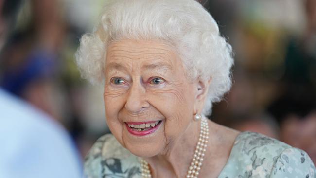 Britain's Queen Elizabeth II smiles during a visit to officially open a new building at Thames Hospice in Maidenhead, Berkshire, on July 15, 2022. Picture: Kirsty O'Connor / AFP.