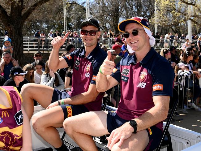 MELBOURNE, AUSTRALIA - SEPTEMBER 29:  Lincoln McCarthy and Josh Dunkley of the Lions attend the 2023 AFL Grand Final Parade on September 29, 2023 in Melbourne, Australia. (Photo by Quinn Rooney/Getty Images)