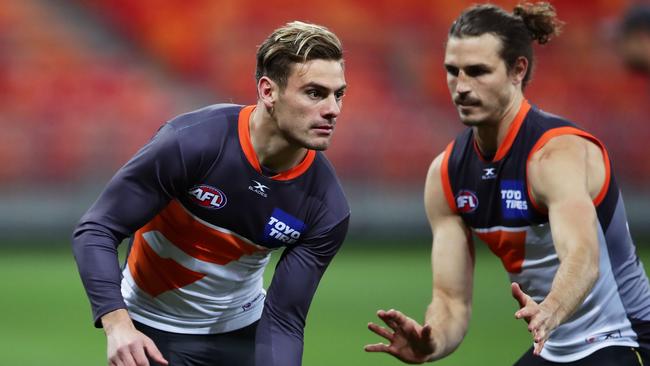Stephen Coniglio can shut down opponents but also win plenty of contested footy. Pic: Getty Images
