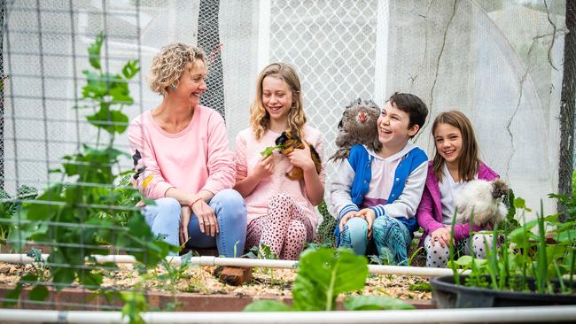 Narrah Zollo and her children Stella, 12 and Nia, 9, with friend Rory, 8. Picture: Tom Huntley