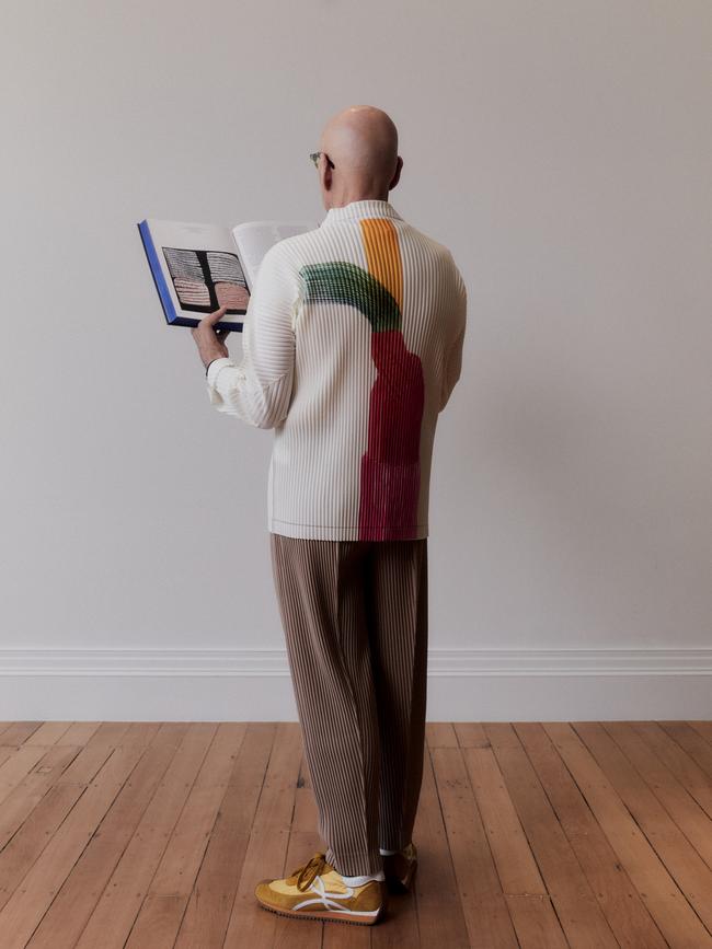 Jopling, looking at an image of the piece he is lending to The Potter in the book dedicated to the gallery’s upcoming exhibition. Art, he says, makes people more engaged, more socially aware and more inclined to be inclusive. Picture: Ivana Martyn-Zyznikow