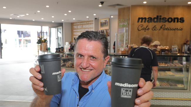 Businesses shut down in Broadbeach due to the new Coronavirus regulations. Madison’s owner Lincoln Testa remaining upbeat and selling takeaway coffee and food. Picture Glenn Hampson