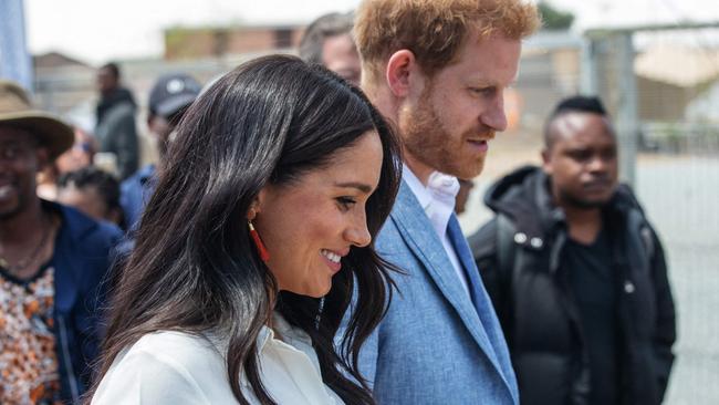 Meghan Markle’s main virtue is to have whisked hubby Harry away to California where he can reign like pop royalty. Picture: AFP