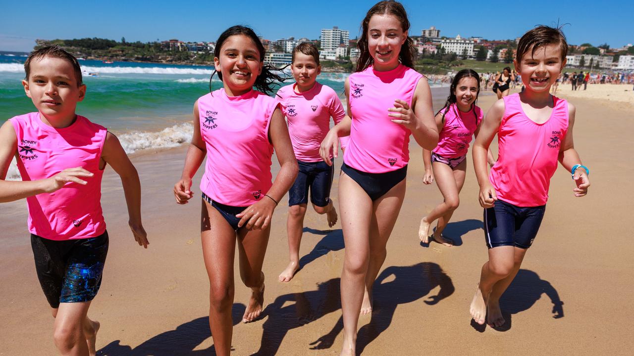 Bondi Nippers, Benji Donald, 8, Poppy Singh, 9, Harry Donald, 8, Milla Shemesh, 12, Abbie Shemesh, 9, and Owen Harvey, 9, at Bondi Beach. Picture: Justin Lloyd