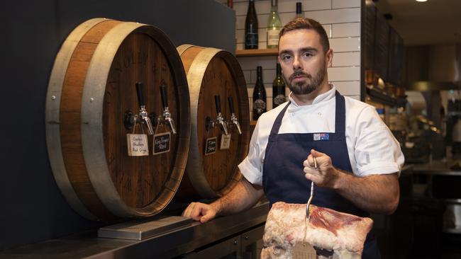 Steak &amp; Co’s Terry O'Brien with a mouth-watering dry-aged rib-eye. Picture: Monique Harmer