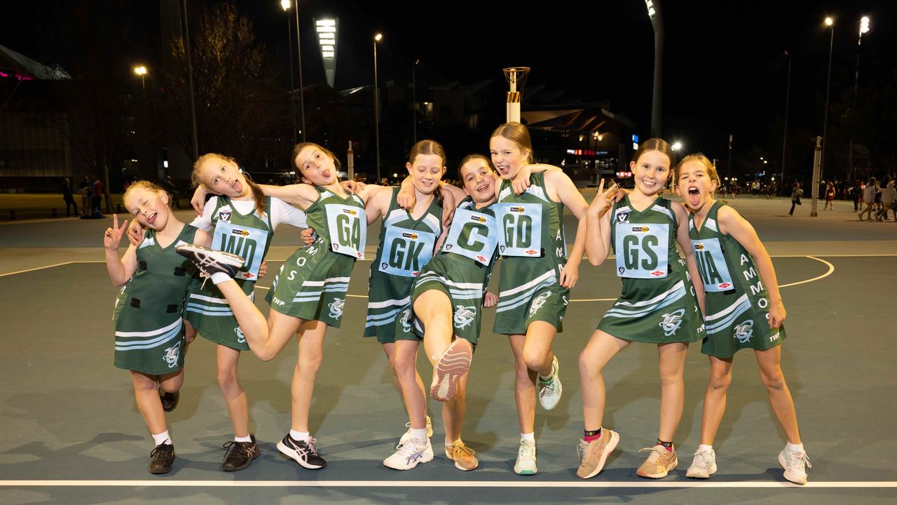Geelong Amateurs Emeralds under-11 netball team pull their funniest faces.