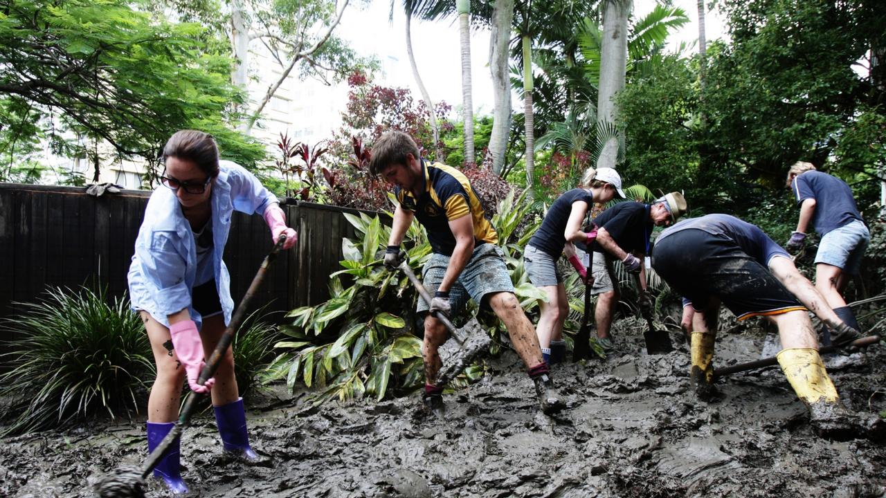Queensland volunteers hard at work in the mud back in 2011.