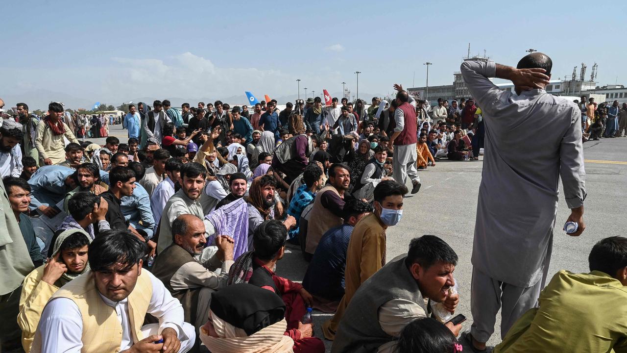 Afghan passengers wait to leave Kabul International Airport. Picture: AFP