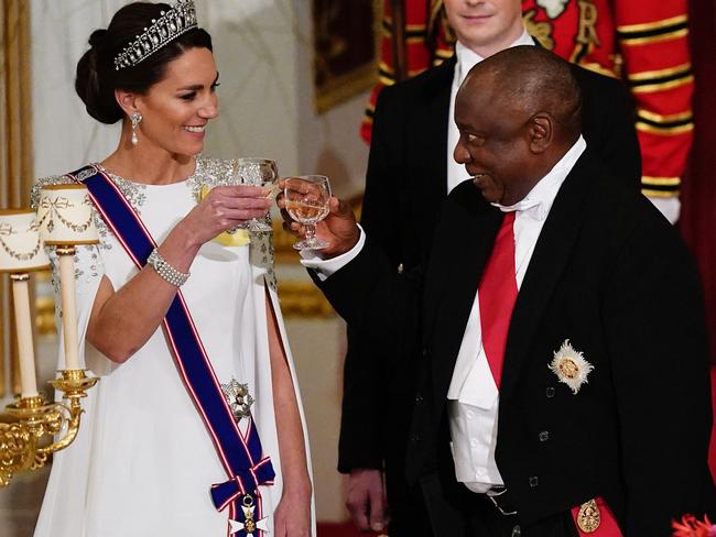 South Africa's President Cyril Ramaphosa (R) toasts a glass with Kate Middleton during a banquet at Buckingham Palace. Picture: AFP