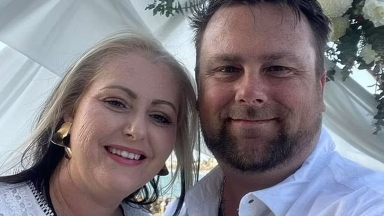 Julie 'Julez' Seed, 38, is pictured with her fiance Chris Smith Picture: Supplied