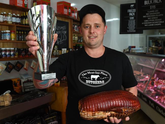 Mr Andrew with his award-winning ham off the bone. Picture: Josie Hayden