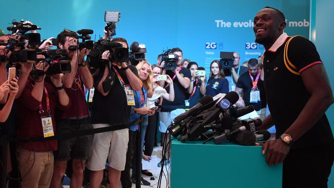 Bolt was the centre of a packed press conference on the Gold Coast. Picture: AAP Image/Dean Lewins