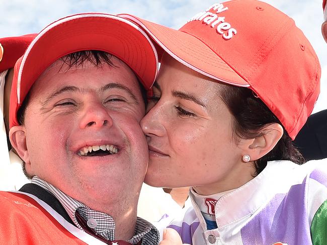 Steven (left) and Michelle Payne celebrate after Michelle rode Prince of Penzance to victory in the Melbourne Cup at Flemington Racecourse in Melbourne, Tuesday, Nov. 3, 2015. (AAP Image/Julian Smith) NO ARCHIVING, EDITORIAL USE ONLY