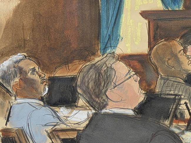 Assistant US Attorney Emily Johnson, right, gestures to Sean Diddy Combs, far left, while giving her opening statement the first day of trial at Manhattan federal court, Monday, May 12, 2025, in New York. (Elizabeth Williams via AP)