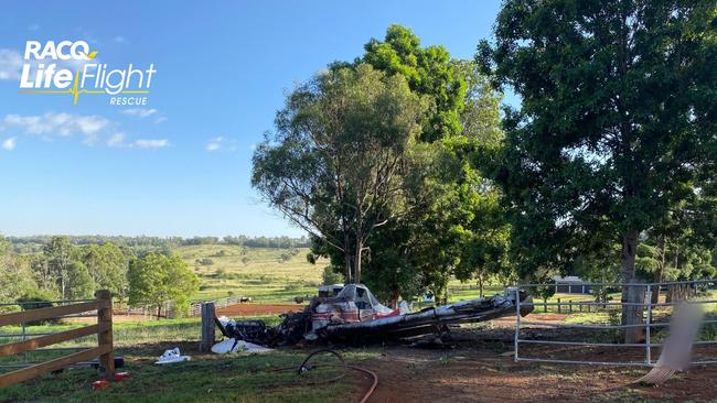 A pilot has been lucky to escape after crashing his crop duster into a paddock at Corndale on Sunday morning at 6.30am. (Photo: Courtesy RACQ LifeFlight Rescue)