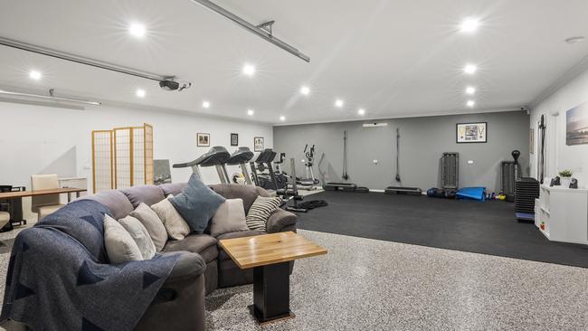 Fitness fanatics would love to get their hands on the home gym at 43 Grosvenor Drive, Wandana Heights.