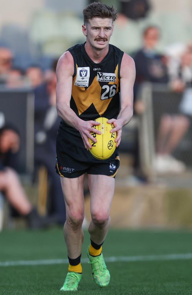 Riley Bice lines up a kick during the VFL grand final. Picture: Rob Lawson/AFL Photos via Getty Images