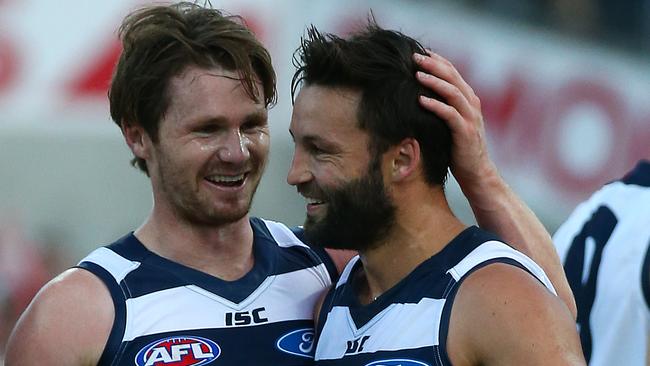 Round 3, and after the Cats big win over Brisbane Paddy Dangerfield congratulates Jimmy on his superb growth. Danger started his beard in 2013. Picture: George Salpigtidis