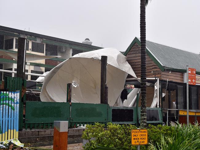 Shops have been trashed on the main street of Airlie during Cyclone Debbie. Picture: Alix Sweeney