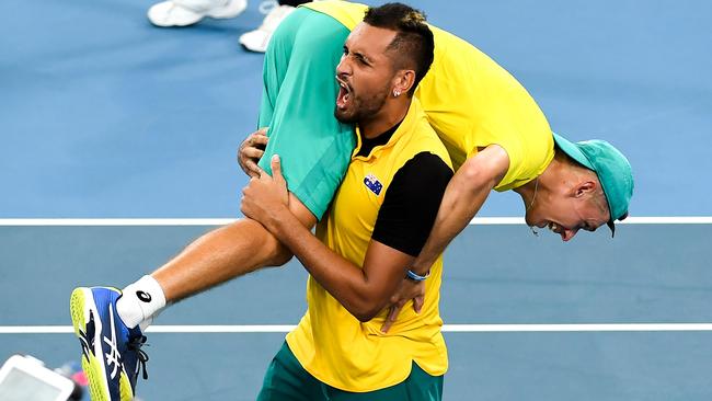 Nick Kyrgios revels in a team environment including the ATP Cup when he carried Alex de Minaur after defeating Great Britain in Sydney Picture: AFP