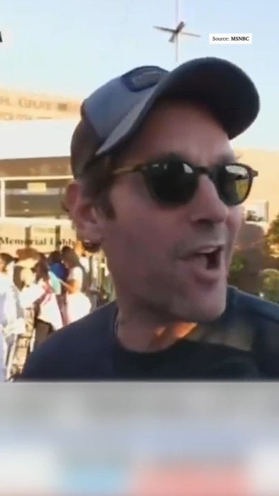 Hollywood star Paul Rudd hands out water to voters in Pennsylvania