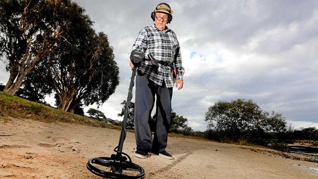 SEARCHING: 78 Year old Alan Davis from Pottsville gets around the Tweed Coast with his metal detector, collecting lost items for free. Picture: Scott Powick