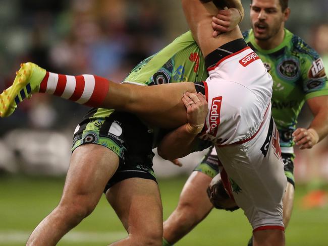 WOLLONGONG, AUSTRALIA - JULY 14: Timoteo Lafai of the Dragons Is tackled by Nick Cotric of the Raiders during the round 17 NRL match between the St George Illawarra Dragons and the Canberra Raiders at WIN Stadium on July 14, 2019 in Wollongong, Australia. (Photo by Mark Metcalfe/Getty Images)