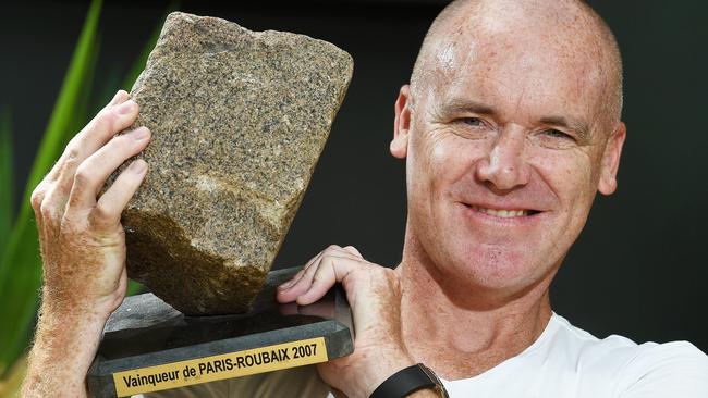 Stuart O'Grady at home with his Paris-Roubaix rock trophy. Picture: Roger Wyman